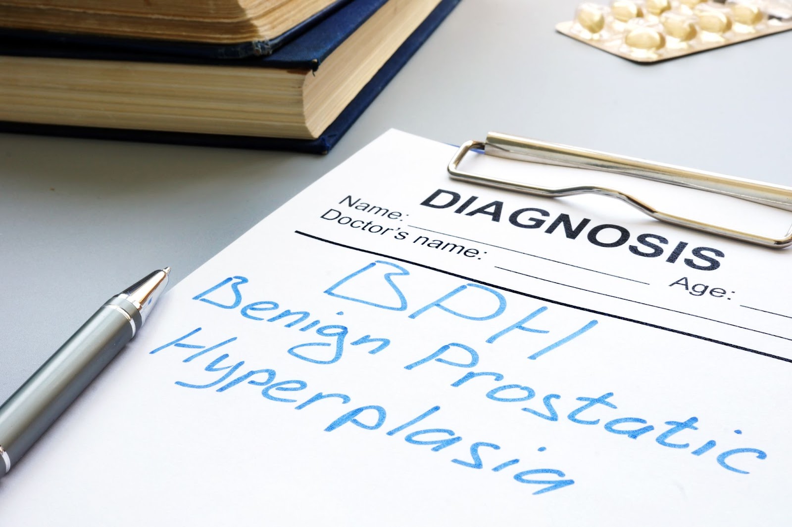 Doctor’s diagnosis sheet with words “BPH” written across.